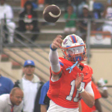 Bolles quarterback Ethan Drumm (10) throws a pass in warm-ups before a high school football game against Raines on August 23, 2024. [Clayton Freeman/Florida Times-Union]