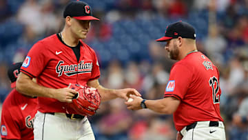 Sep 16, 2024; Cleveland, Ohio, USA; Cleveland Guardians manager Stephen Vogt (12) relieves starting pitcher Matthew Boyd (16) during the third inning against the Minnesota Twins at Progressive Field. Mandatory Credit: Ken Blaze-Imagn Images