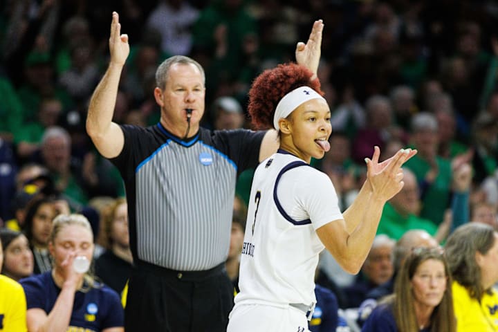 Notre Dame guard Hannah Hidalgo celebrates after making a three pointer against Michigan. 