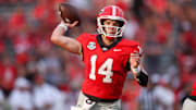 Sep 6, 2025; Athens, Georgia, USA; Georgia Bulldogs quarterback Gunner Stockton (14) throws a pass against the Austin Peay Governors in the fourth quarter at Sanford Stadium. Mandatory Credit: Brett Davis-Imagn Images
