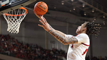 Dec 14, 2024; North Little Rock, Arkansas, USA; Arkansas Razorbacks forward Trevon Brazile (4) shoots the ball against the UCA Bears in the second half at Simmons Bank Arena. Arkansas won 82-57. Mandatory Credit: Nelson Chenault-Imagn Images