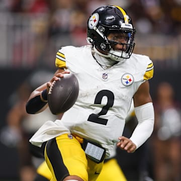 Sep 8, 2024; Atlanta, Georgia, USA; Pittsburgh Steelers quarterback Justin Fields (2) scrambles against the Atlanta Falcons in the fourth quarter at Mercedes-Benz Stadium. Mandatory Credit: Brett Davis-Imagn Images