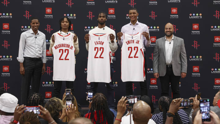 Jun 24, 2022; Houston, Texas, USA; Houston Rockets head coach Stephen Silas and first round draft picks TyTy Washington Jr. and Tari Eason and Jabari Smith Jr. and Houston Rockets general manager Rafael Stone pose for a picture during a press conference at Toyota Center. Mandatory Credit: Troy Taormina-USA TODAY Sports