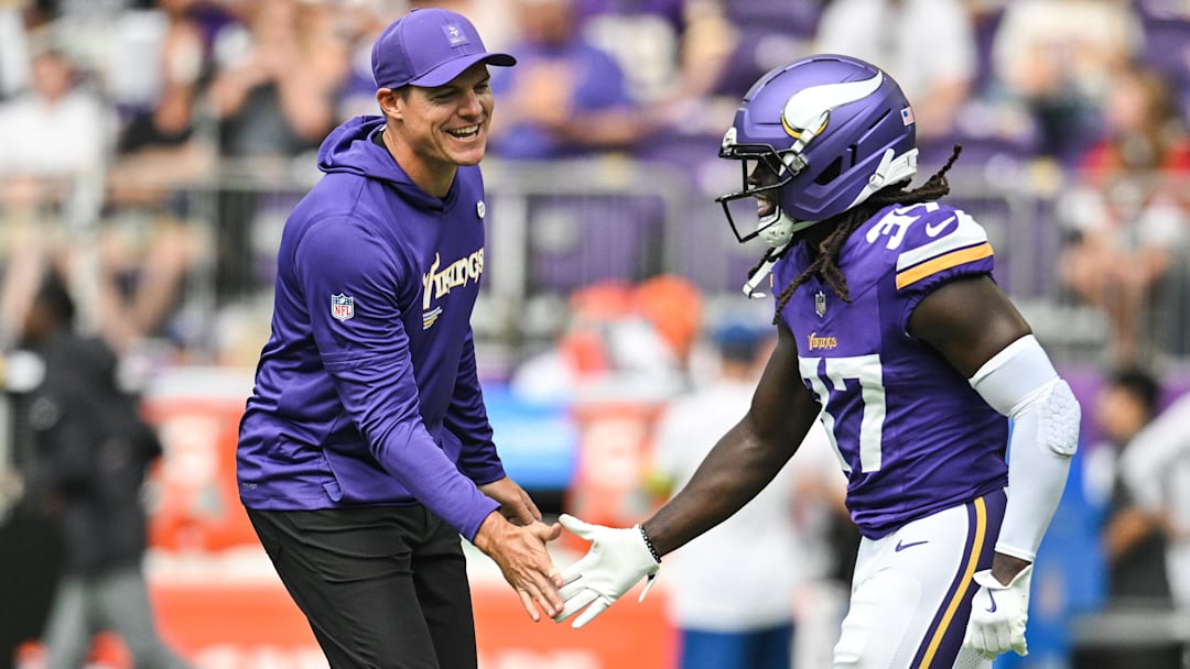 Aug 9, 2025; Minneapolis, Minnesota, USA; Minnesota Vikings head coach Kevin O'Connell reacts with cornerback Tavierre Thomas (37) before the game against the Houston Texans at U.S. Bank Stadium.
