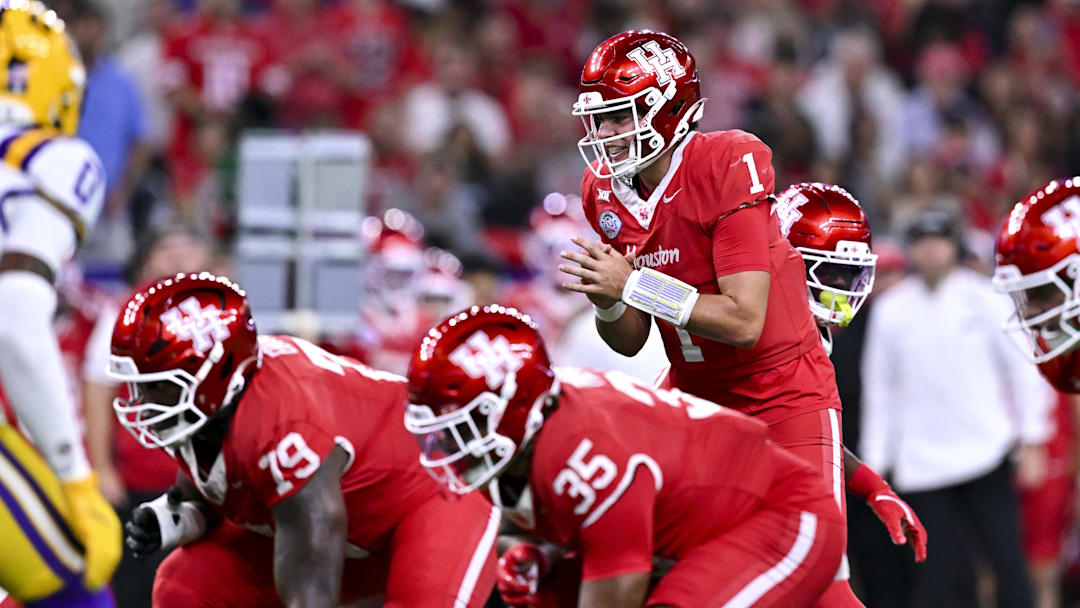 Dec 27, 2025; Houston, TX, USA; Houston Cougars quarterback Conner Weigman (1) calls a play during the first half against the Louisiana State Tigers at NRG Stadium. Mandatory Credit: Maria Lysaker-Imagn Images 