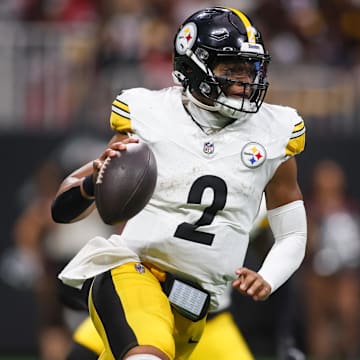 Sep 8, 2024; Atlanta, Georgia, USA; Pittsburgh Steelers quarterback Justin Fields (2) scrambles against the Atlanta Falcons in the fourth quarter at Mercedes-Benz Stadium. Mandatory Credit: Brett Davis-Imagn Images