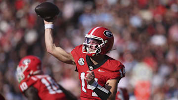 Oct 18, 2025; Athens, Georgia, USA; Georgia Bulldogs quarterback Gunner Stockton (14) passes against the Mississippi Rebels during the first quarter of the game at Sanford Stadium. Mandatory Credit: Brett Davis-Imagn Images