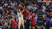 Nov 30, 2023; Miami, Florida, USA; Indiana Pacers center Myles Turner (33) shoots the basketball over Miami Heat center Thomas Bryant (31) during the third quarter at Kaseya Center. Mandatory Credit: Sam Navarro-Imagn Images