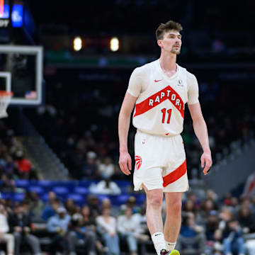 Mar 24, 2025; Washington, District of Columbia, USA; Toronto Raptors center Colin Castleton (11) looks on during the fourth quarter against the Washington Wizards at Capital One Arena. Mandatory Credit: Reggie Hildred-Imagn Images