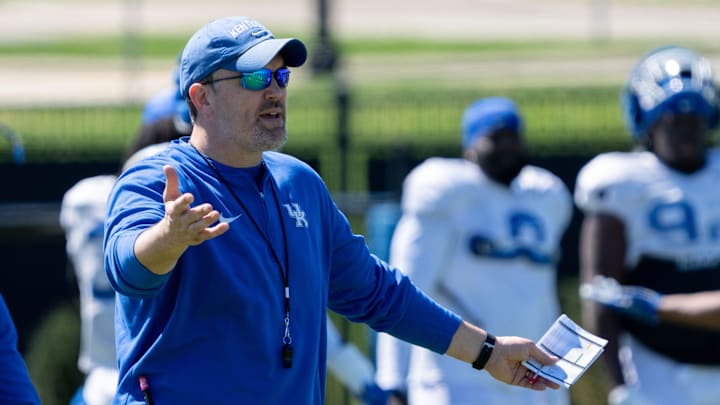 University of Kentucky Defensive Coordinator and Outside Linebackers coach Brad White speaks to the team during spring football practice on Saturday, April 6, 2024.