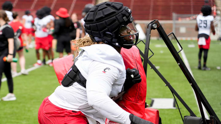 Cincinnati Bearcats offensive lineman Deondre Buford (56) participates in drills during football practice, Wednesday, July 31, 2024, at Nippert Stadium in Cincinnati.