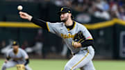 Pittsburgh Pirates pitcher Paul Skenes pitches against the Arizona Diamondbacks at Chase Field during an MLB game