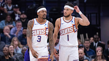 Apr 12, 2024; Sacramento, California, USA; Phoenix Suns guard Bradley Beal (3) and guard Devin Booker (1) walk off the court during a time out in the second quarter against the Sacramento Kings at Golden 1 Center. Mandatory Credit: Ed Szczepanski-Imagn Images