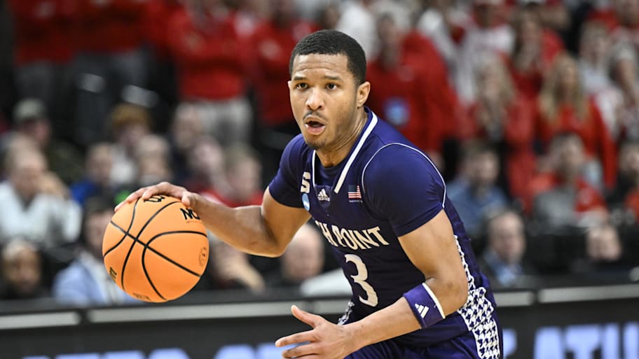 High Point Panthers guard Rob Martin dribbles against the Wisconsin Badgers.