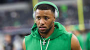 Philadelphia Eagles running back Saquon Barkley (26) wears Beats by Dre during warm ups prior to the game against the Dallas Cowboys at AT&T Stadium. 