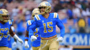 UCLA Bruins defensive lineman Laiatu Latu (15) celebrates after intercepting a pass against the North Carolina Central Eagles during the first half at Rose Bowl.