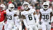 Sep 7, 2024; College Park, Maryland, USA;  Michigan State Spartans defensive back Ade Willie (6) reacts after tackling Maryland Terrapins wide receiver Braeden Wisloski (19) on a first half kickoff return at SECU Stadium. Mandatory Credit: Tommy Gilligan-Imagn Images