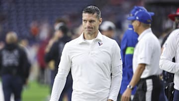 Dec 24, 2023; Houston, Texas, USA; Houston Texans general manager Nick Caserio walks on the field before the game against the Cleveland Browns at NRG Stadium. Mandatory Credit: Troy Taormina-Imagn Images