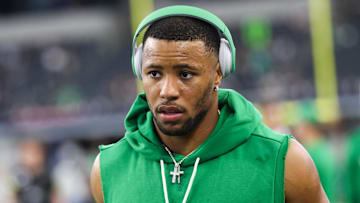 Philadelphia Eagles running back Saquon Barkley (26) wears Beats by Dre during warm ups prior to the game against the Dallas Cowboys at AT&T Stadium. 