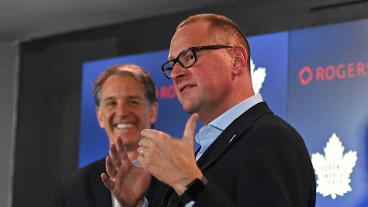 Jun 1, 2023; Toronto, Ontario, CANADA; Toronto Maple Leafs new general manager Brad Treliving is introduced by club president Brendan Shanahan (left) at a press conference at Scotiabank Arena. Mandatory Credit: Dan Hamilton-Imagn Images