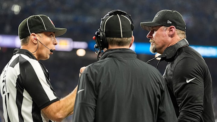 Detroit Lions head coach Dan Campbell talks to a referee regarding a call during the second half of the NFC divisional round against Washington Commanders at Ford Field in Detroit on Saturday, Jan. 18, 2025.