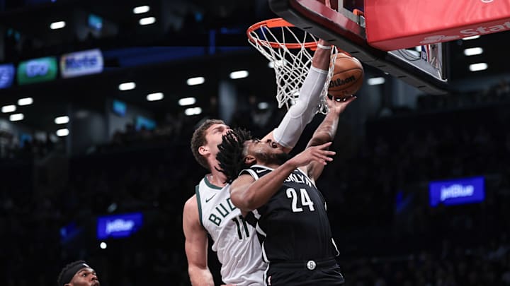 Dec 27, 2023; Brooklyn, New York, USA; Brooklyn Nets guard Cam Thomas (24) goes to the basket against Milwaukee Bucks center Brook Lopez (11) during the first quarter at Barclays Center. Mandatory Credit: Vincent Carchietta-Imagn Images Dec 27, 2023; Brooklyn, New York, USA; Brooklyn Nets guard Cam Thomas (24) goes to the basket against Milwaukee Bucks center Brook Lopez (11) during the first quarter at Barclays Center. Mandatory Credit: Vincent Carchietta-Imagn Images