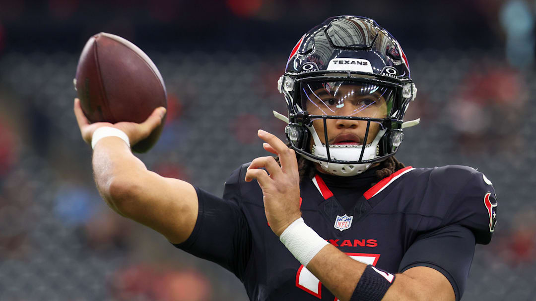 Houston Texans quarterback C.J. Stroud (7) warms up before playing against the Arizona Cardinals at NRG Stadium. 