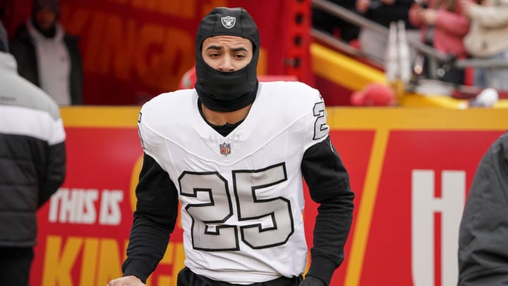 Dec 25, 2023; Kansas City, Missouri, USA; Las Vegas Raiders safety Tre'von Moehrig (25) runs onto the field against the Kansas City Chiefs prior to a game at GEHA Field at Arrowhead Stadium. Mandatory Credit: Denny Medley-USA TODAY Sports