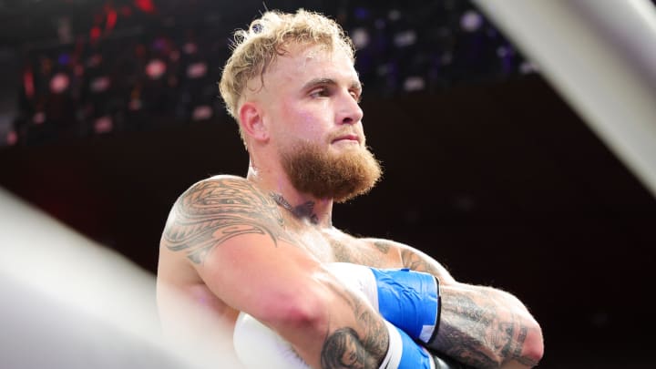 Dec 15, 2023; Orlando, Florida, USA;  Jake Paul reacts after knocking out Andre August in the first round at Caribe Royale Orlando. Mandatory Credit: Nathan Ray Seebeck-USA TODAY Sports