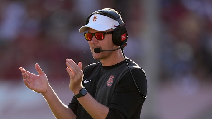 Aug 30, 2025; Los Angeles, California, USA; Southern California Trojans head coach Lincoln Riley watches from the sidelines against the Missouri State Bears in the first half at United Airlines Field at Los Angeles Memorial Coliseum. Mandatory Credit: Kirby Lee-Imagn Images Aug 30, 2025; Los Angeles, California, USA; Southern California Trojans head coach Lincoln Riley watches from the sidelines against the Missouri State Bears in the first half at United Airlines Field at Los Angeles Memorial Coliseum. Mandatory Credit: Kirby Lee-Imagn Images