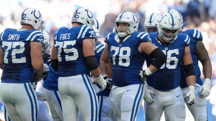 The Indianapolis Colts offensive line resets between plays Sunday, Oct. 2, 2022, during a game against the Tennessee Titans at Lucas Oil Stadium in Indianapolis.