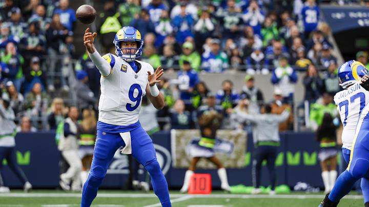 Nov 3, 2024; Seattle, Washington, USA; Los Angeles Rams quarterback Matthew Stafford (9) passes against the Seattle Seahawks during the first quarter at Lumen Field. Mandatory Credit: Joe Nicholson-Imagn Images