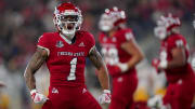 Nov 25, 2022; Fresno, California, USA; Fresno State Bulldogs wide receiver Nikko Remigio (1) reacts after catching a pass for a touchdown against the Wyoming Cowboys in the first quarter at Valley Children's Stadium. Mandatory Credit: Cary Edmondson-USA TODAY Sports