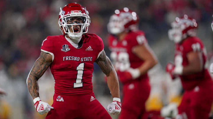 Nov 25, 2022; Fresno, California, USA; Fresno State Bulldogs wide receiver Nikko Remigio (1) reacts after catching a pass for a touchdown against the Wyoming Cowboys in the first quarter at Valley Children's Stadium. Mandatory Credit: Cary Edmondson-USA TODAY Sports