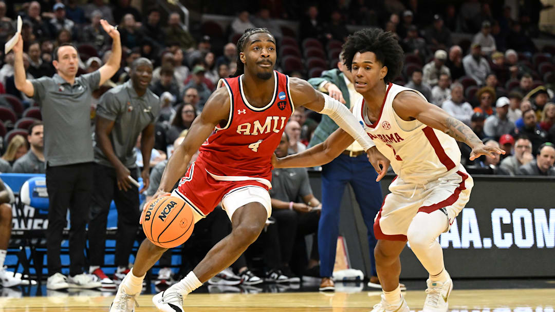 Guard Josh Omojafo, shown here in last season's NCAA tournament game against Alabama, committed to USF from Robert Morris.
