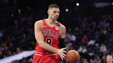 Apr 13, 2025; Philadelphia, Pennsylvania, USA; Chicago Bulls center Nikola Vucevic (9) receives a pass against the Philadelphia 76ers in the first quarter at Wells Fargo Center. Mandatory Credit: Kyle Ross-Imagn Images
