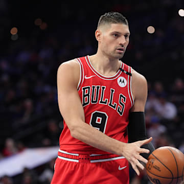 Apr 13, 2025; Philadelphia, Pennsylvania, USA; Chicago Bulls center Nikola Vucevic (9) receives a pass against the Philadelphia 76ers in the first quarter at Wells Fargo Center. Mandatory Credit: Kyle Ross-Imagn Images