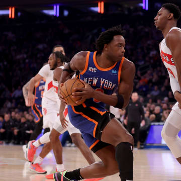 Jan 20, 2024; New York, New York, USA; New York Knicks forward OG Anunoby (8) drives to the basket against Toronto Raptors guard RJ Barrett (9) during the first quarter at Madison Square Garden. Mandatory Credit: Brad Penner-USA TODAY Sports