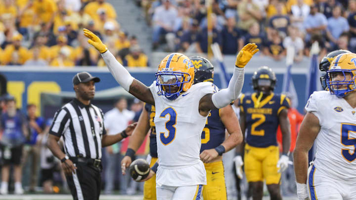 Sep 13, 2025; Morgantown, West Virginia, USA; Pittsburgh Panthers linebacker Rasheem Biles (3) celebrates a defensive stop during the third quarter against the West Virginia Mountaineers at Milan Puskar Stadium. Mandatory Credit: Ben Queen-Imagn Images