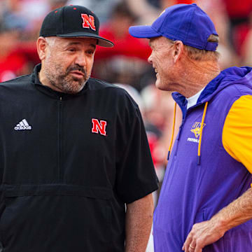 Sep 14, 2024; Lincoln, Nebraska, USA; Nebraska Cornhuskers head coach Matt Rhule and Northern Iowa Panthers head coach Mark Farley talk before the game at Memorial Stadium.