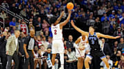 Mar 27, 2025; Newark, NJ, USA; Alabama Crimson Tide guard Aden Holloway (2) shoots the ball against Brigham Young Cougars guard Egor Demin (3) during the second half during an East Regional semifinal of the 2025 NCAA tournament at Prudential Center. Mandatory Credit: Robert Deutsch-Imagn Images