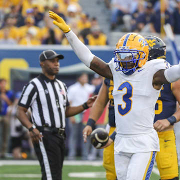 Sep 13, 2025; Morgantown, West Virginia, USA; Pittsburgh Panthers linebacker Rasheem Biles (3) celebrates a defensive stop during the third quarter against the West Virginia Mountaineers at Milan Puskar Stadium. Mandatory Credit: Ben Queen-Imagn Images