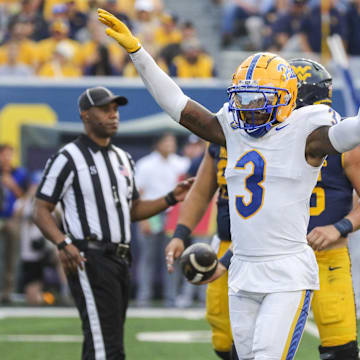 Sep 13, 2025; Morgantown, West Virginia, USA; Pittsburgh Panthers linebacker Rasheem Biles (3) celebrates a defensive stop during the third quarter against the West Virginia Mountaineers at Milan Puskar Stadium. Mandatory Credit: Ben Queen-Imagn Images