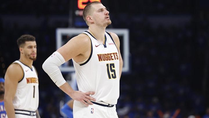 Denver Nuggets center Nikola Jokic watches Oklahoma City Thunder guard Shai Gilgeous-Alexander shoot in the 2025 NBA Playoffs