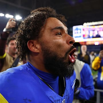 Jan 13, 2025; Glendale, AZ, USA; Los Angeles Rams running back Kyren Williams (23) reacts after the NFC wild card game against the Minnesota Vikings at State Farm Stadium. Mandatory Credit: Mark J. Rebilas-Imagn Images