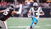 Nov 16, 2025; Atlanta, Georgia, USA;  Carolina Panthers running back Rico Dowdle (5) runs with the ball in the first quarter against the Atlanta Falcons at Mercedes-Benz Stadium. Mandatory Credit: Dale Zanine-Imagn Images