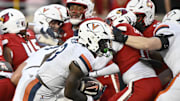 Oct 4, 2025; Louisville, Kentucky, USA; Virginia Cavaliers running back J'Mari Taylor (3) runs the ball in for a touchdown during the overtime against the Louisville Cardinals at L&N Federal Credit Union Stadium. Virginia defeated Louisville 30-27. Mandatory Credit: Jamie Rhodes-Imagn Images