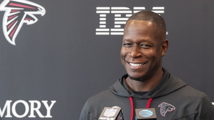 Jul 25, 2024; Buford, GA, USA; Atlanta Falcons head coach Raheem Morris talks to the media on the first day of training camp at Falcons Training Camp. Mandatory Credit: Dale Zanine-USA TODAY Sports