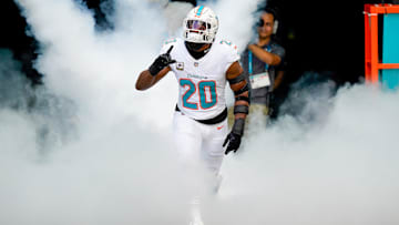 Miami Dolphins linebacker Jordyn Brooks (20) runs on the field before a game against the Buffalo Bills at Hard Rock Stadium. 