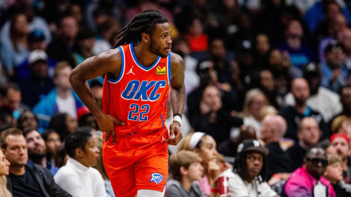 Apr 7, 2024; Charlotte, North Carolina, USA; Oklahoma City Thunder guard Cason Wallace (22) celebrates a three point basket against the Charlotte Hornets during the fourth quarter at Spectrum Center. Mandatory Credit: Scott Kinser-USA TODAY Sports